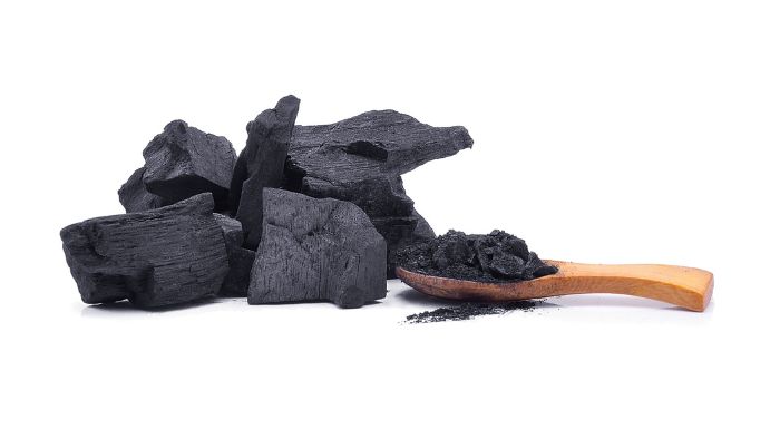  Does charcoal absorb moisture in soil?